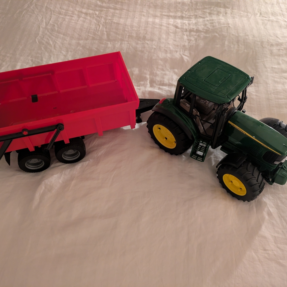 John Deere Green Tractor with Pink Trailer